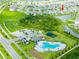 Aerial view of the neighborhood amenities including a community pool, playground, and greenspace at 5934 Shingle Creek Rd, Lakeland, FL 33811