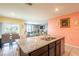 A view of the open kitchen area with granite countertops and stainless sink at 5934 Shingle Creek Rd, Lakeland, FL 33811