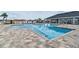 A beautiful community pool with a shallow-water lounge section and a large section for swimming laps at 5934 Shingle Creek Rd, Lakeland, FL 33811