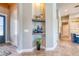 Stylish hallway nook with decorative shelving and views into the home at 12902 Sw 138Th Loop, Dunnellon, FL 34432
