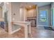 Efficient laundry area complete with modern appliances, storage cabinets, and ample counter space at 12902 Sw 138Th Loop, Dunnellon, FL 34432
