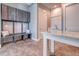 Mud room with a convenient bench, upper cabinetry, and adjacent counter space perfect for storage at 12902 Sw 138Th Loop, Dunnellon, FL 34432