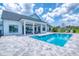 Luxury home with a private swimming pool and a spacious patio deck at 12902 Sw 138Th Loop, Dunnellon, FL 34432