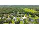 Forested area with several homes, ponds, outbuildings and lush lawns at 3229 Gardner Oaks Ln, Lakeland, FL 33810