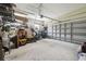 Spacious garage features high ceilings and room for two cars and extra storage at 3229 Gardner Oaks Ln, Lakeland, FL 33810