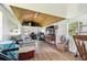 Well-lit shed interior with vinyl floors, white walls and a seating area with a window view at 3229 Gardner Oaks Ln, Lakeland, FL 33810