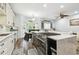 Open-concept kitchen with large island and seamless flow into living area at 3229 Gardner Oaks Ln, Lakeland, FL 33810