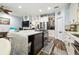 Open floor plan seamlessly connects kitchen and living areas, great for entertaining at 3229 Gardner Oaks Ln, Lakeland, FL 33810