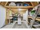 Outbuilding featuring a finished interior with an office area, storage shelving, and a workbench at 3229 Gardner Oaks Ln, Lakeland, FL 33810