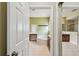 Bathroom featuring a soaking tub, separate vanities, and a glass-enclosed shower at 297 Beacon Pointe Dr, Ocoee, FL 34761