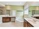 Bathroom featuring a soaking tub, separate vanities, and a window for natural light at 297 Beacon Pointe Dr, Ocoee, FL 34761