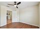 Bedroom with hardwood floors and a ceiling fan at 297 Beacon Pointe Dr, Ocoee, FL 34761