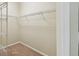 Walk-in closet featuring wire shelving and carpeted floor at 297 Beacon Pointe Dr, Ocoee, FL 34761