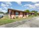 Single-story home featuring mature landscaping and a well-manicured lawn at 89 Fremont Ave # 504, Daytona Beach, FL 32114