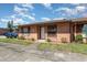 A cozy home boasting mature landscaping, shrubs, and a well manicured lawn at 89 Fremont Ave # 504, Daytona Beach, FL 32114