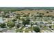 Neighborhood shot of a quiet community, lush landscaping, and well-maintained homes at 508 Alcazar Ct, Lady Lake, FL 32159