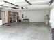 Spacious two-car garage with ample room for storage, tools and parking at 508 Alcazar Ct, Lady Lake, FL 32159