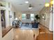 Inviting living room with ample natural light and comfortable furnishings at 508 Alcazar Ct, Lady Lake, FL 32159