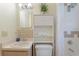 Bathroom area showcasing a shower/tub combination and neutral-colored vanity with matching fixtures and tiles at 13449 Ashley Ct, Grand Island, FL 32735