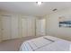 This cozy bedroom offers ample closet space, providing lots of storage at 13449 Ashley Ct, Grand Island, FL 32735