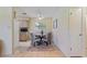 Cozy dining area features a round table with four chairs and a neutral color scheme at 13449 Ashley Ct, Grand Island, FL 32735