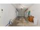 A spacious garage with painted walls and a concrete floor is ready for your vehicles and storage at 13449 Ashley Ct, Grand Island, FL 32735