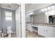Bathroom with toilet and vanity with granite countertops and great lighting at 16324 Brisk Breeze Aly, Winter Garden, FL 34787