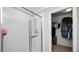 Tiled stand-up shower stall with glass doors and stainless hardware at 16324 Brisk Breeze Aly, Winter Garden, FL 34787