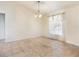Dining room featuring tile flooring and a window with bright, natural light at 21590 Sw 84Th Loop, Dunnellon, FL 34431