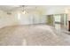 Expansive living room with tile flooring and modern ceiling fan at 21590 Sw 84Th Loop, Dunnellon, FL 34431