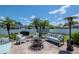 Outdoor patio featuring cushioned seating arrangements and a decorative fire pit, ideal for entertaining at 2869 Hickory Ridge Dr, Lakeland, FL 33813