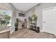 Coffee bar area featuring wood cabinet, shelving, and natural light from a nearby window at 2869 Hickory Ridge Dr, Lakeland, FL 33813