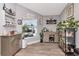 Charming coffee bar area with custom cabinets, shelving, and a bright window with potted plants at 2869 Hickory Ridge Dr, Lakeland, FL 33813