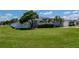 Charming home with a well-manicured lawn at 2869 Hickory Ridge Dr, Lakeland, FL 33813
