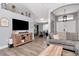 Spacious living area showcasing a neutral color palette, comfortable furnishings, and an open connection to the dining area at 2869 Hickory Ridge Dr, Lakeland, FL 33813