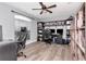 Spacious office space features built in shelving and ample room for multiple computers and chairs at 2869 Hickory Ridge Dr, Lakeland, FL 33813