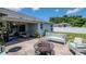 Relaxing patio area with comfortable seating and a cozy fire pit, great for entertaining at 2869 Hickory Ridge Dr, Lakeland, FL 33813