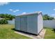 Functional storage shed in backyard providing convenient space for tools and outdoor equipment at 2869 Hickory Ridge Dr, Lakeland, FL 33813
