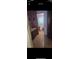 Comfortable bathroom with dark wood cabinets at 12385 Se 86Th Ave, Belleview, FL 34420