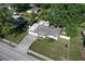 Aerial view of a single story home with a two car garage and a large backyard at 1818 Fredricksburg Ave, Lakeland, FL 33803