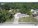 This single story home has mature trees on the property in an established neighborhood at 1818 Fredricksburg Ave, Lakeland, FL 33803