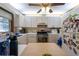 Cozy kitchen features stainless steel appliances, plentiful cabinets, and bright lighting at 1818 Fredricksburg Ave, Lakeland, FL 33803