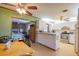 This kitchen features stainless appliances and ample countertop space, plus direct access to the dining room at 1818 Fredricksburg Ave, Lakeland, FL 33803