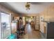 Open living area shows easy access to the backyard, kitchen, and dining room at 1818 Fredricksburg Ave, Lakeland, FL 33803