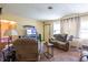 Spacious living room bathed in natural light, featuring cozy seating and modern décor at 1818 Fredricksburg Ave, Lakeland, FL 33803