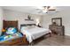 Bright bedroom with laminate floors, ceiling fan, and comfortable decor at 2175 Old Mining Rd, Lakeland, FL 33801
