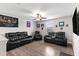 Comfortable living room with leather reclining furniture and contemporary decor at 2175 Old Mining Rd, Lakeland, FL 33801