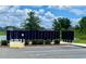 Community mailboxes near a tranquil pond at 2175 Old Mining Rd, Lakeland, FL 33801