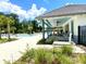 Relaxing poolside view, featuring a covered area and lush landscaping at 2175 Old Mining Rd, Lakeland, FL 33801