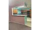Kitchen view with breakfast bar, stainless steel appliances and plenty of cabinet storage at 225 N Palmetto Ave, Fort Meade, FL 33841